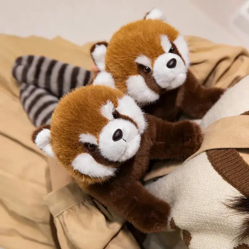 grosse peluche panda roux