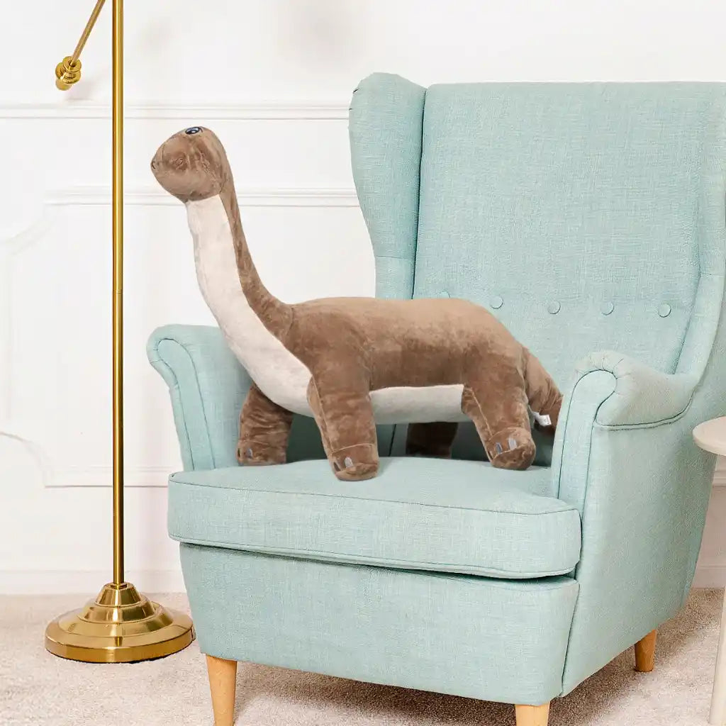 jolie peluche dinosaure marron