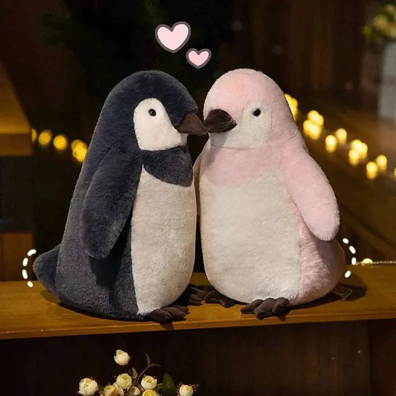 2 peluches pingouins