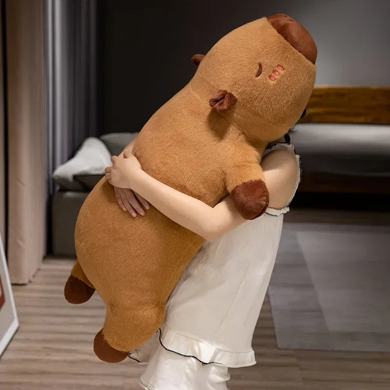 capybara en peluche allongé
