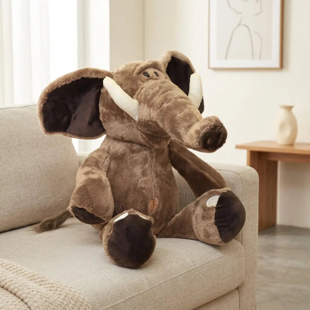Brown elephant with large ears plush toy