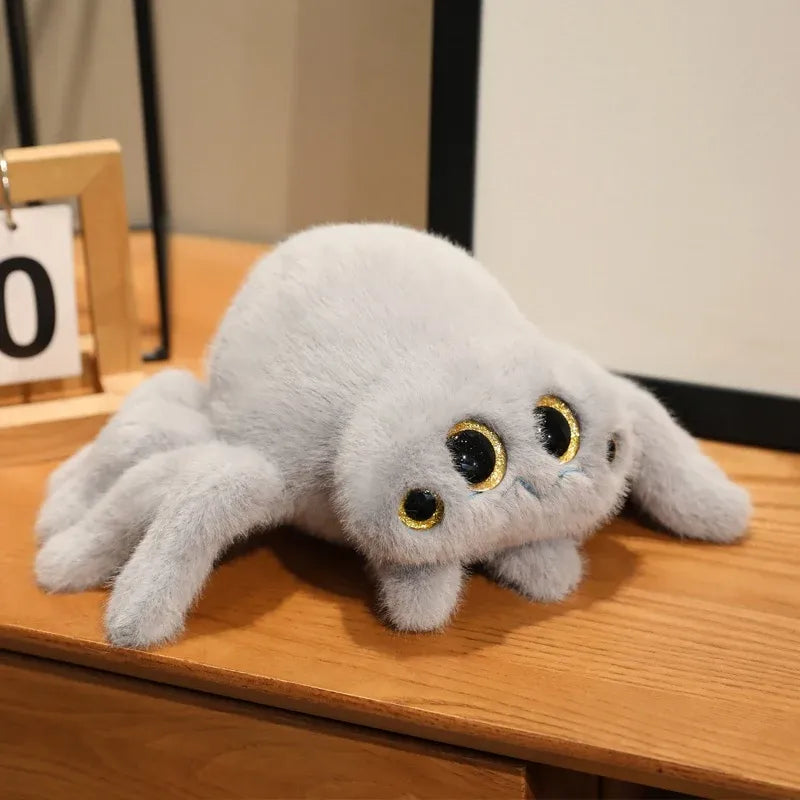 peluche de araña gris