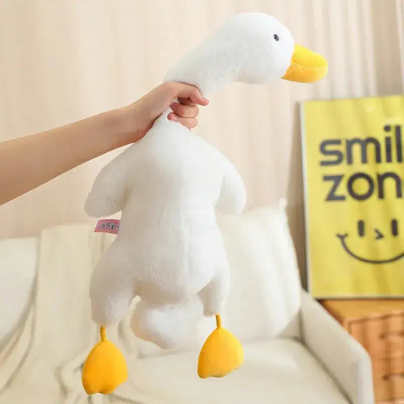 peluche canard hurleur blanc