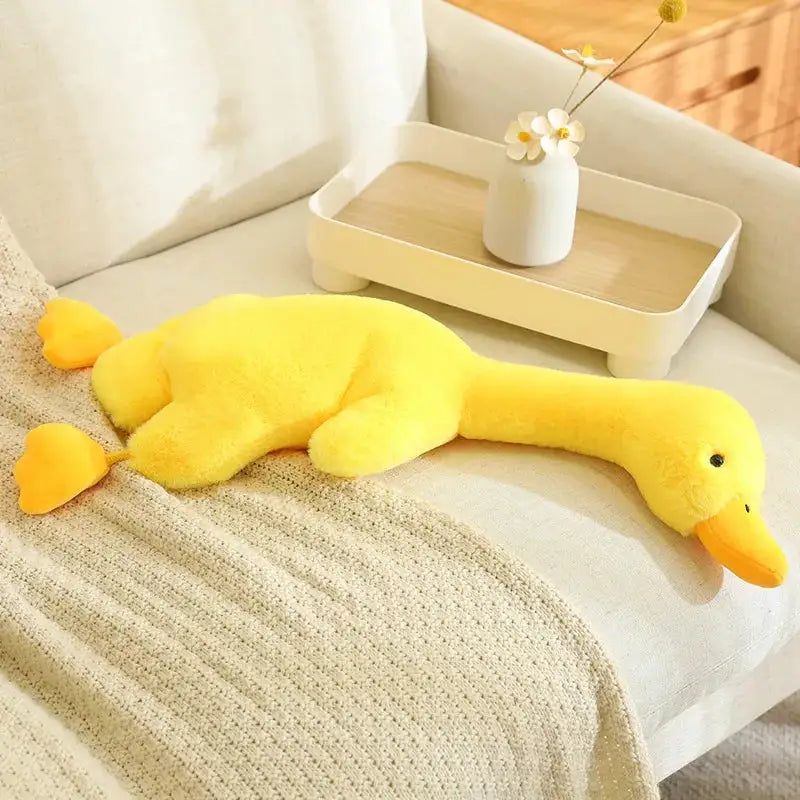 peluche canard hurleur jaune