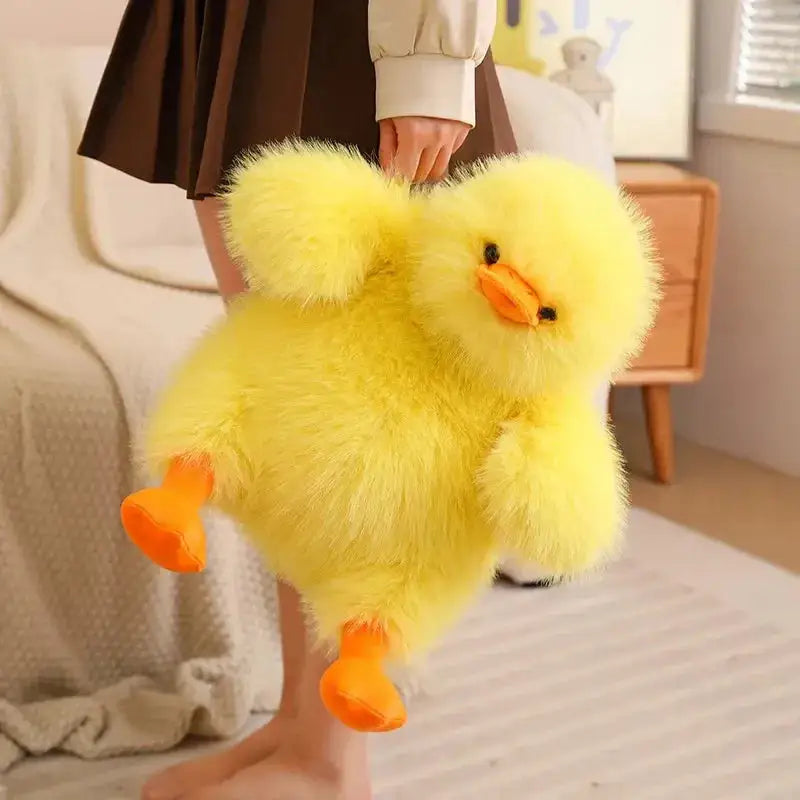 peluche canard touffu jaune