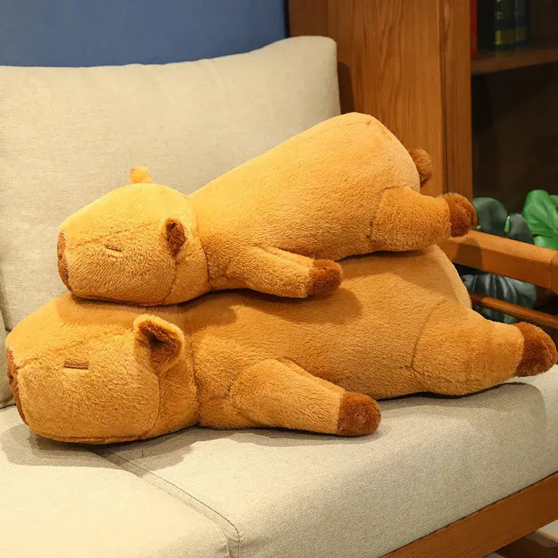 peluches capybaras empilées