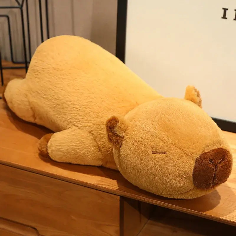 peluche capybara endormi