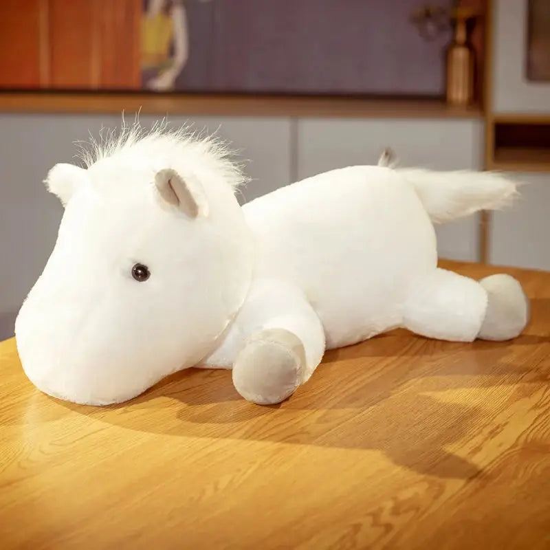 peluche cheval allongé blanc