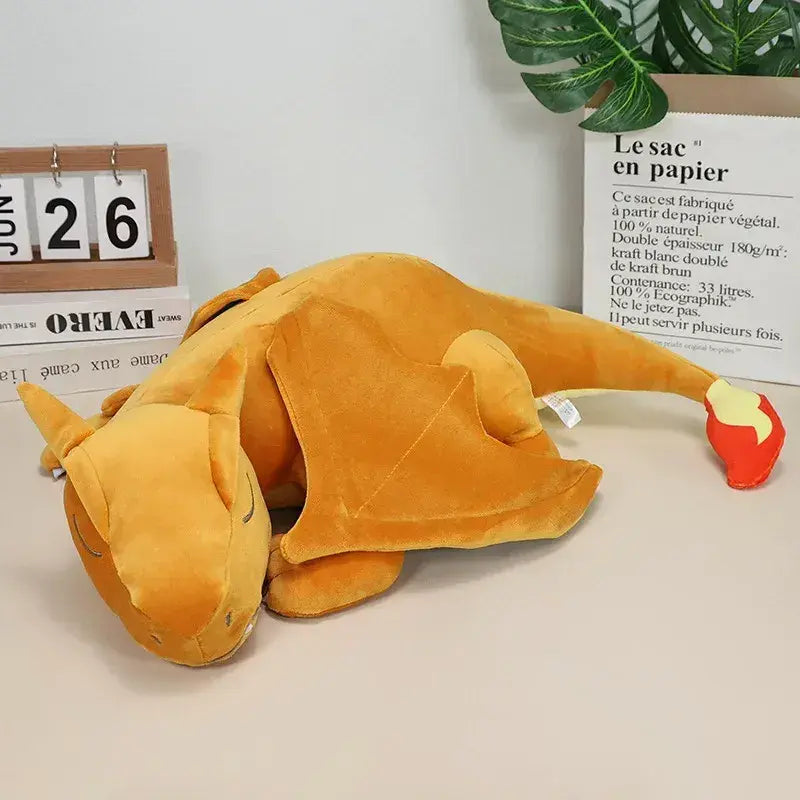 peluche dracaufeu endormi