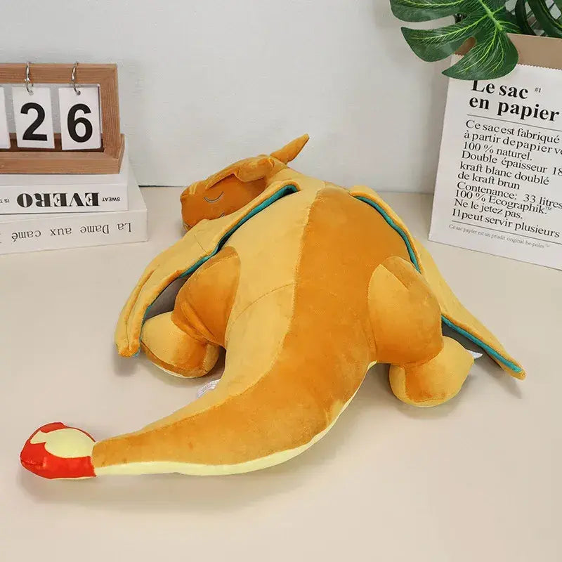 peluche dracaufeu qui dort