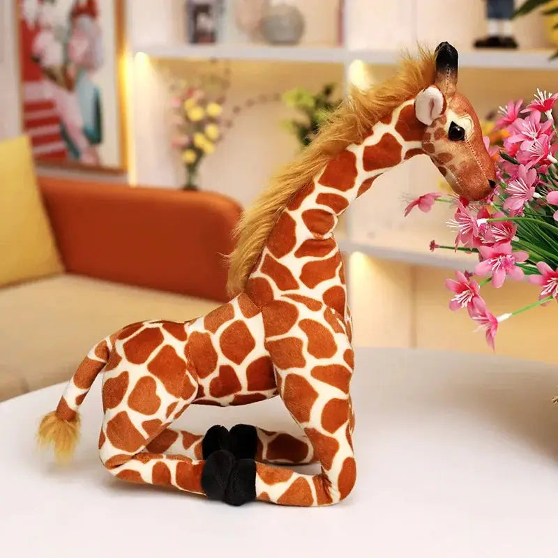 peluche girafe agenouillée