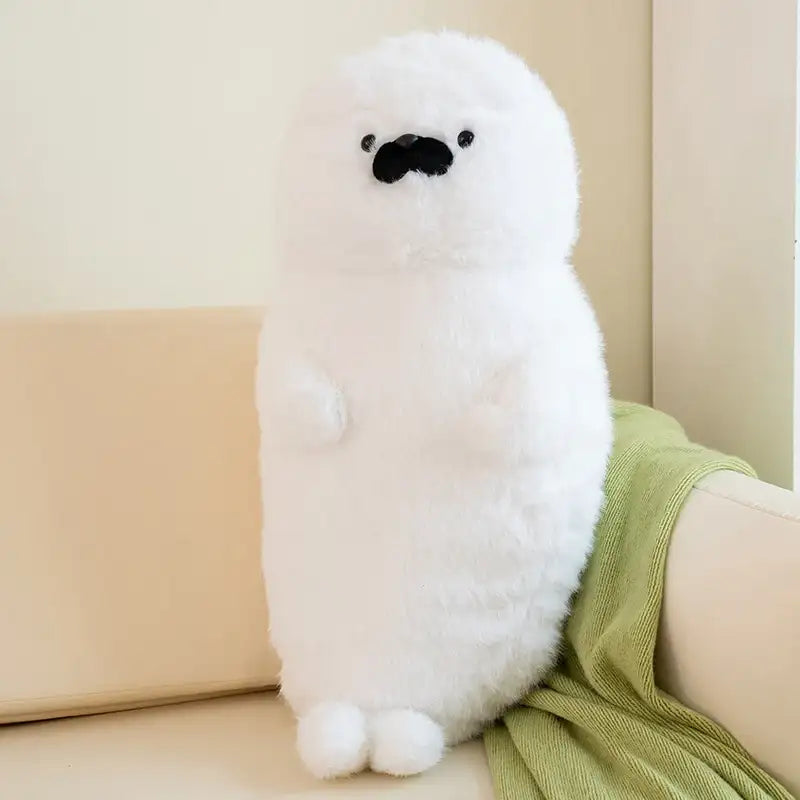 peluche loutre blanche