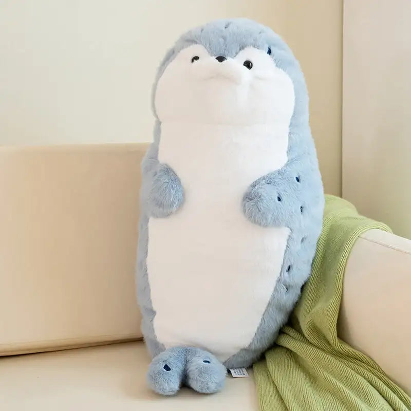 peluche loutre bleue