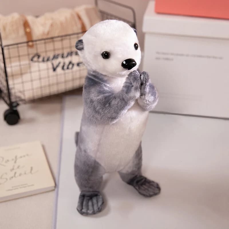 peluche loutre realiste blanche