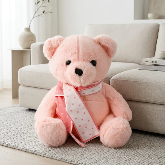 Ours en peluche rose avec écharpe
