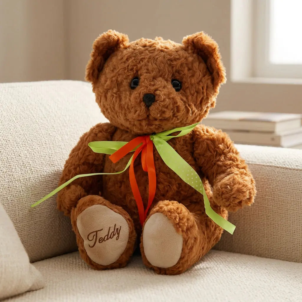 Ours en peluche marron avec nœud rouge et vert
