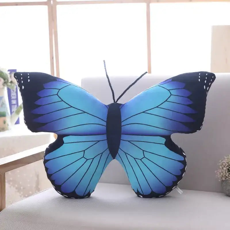 peluche papillon bleu
