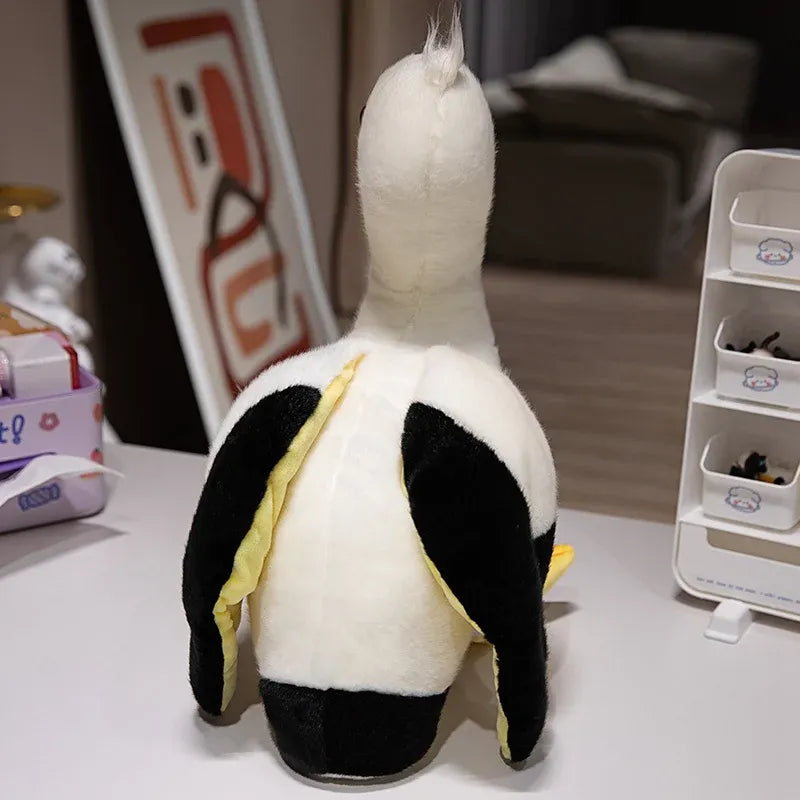 pelican plush toy facing away