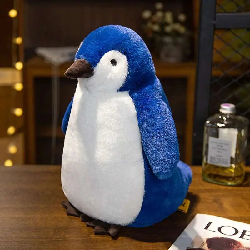 peluche pingouin bleue