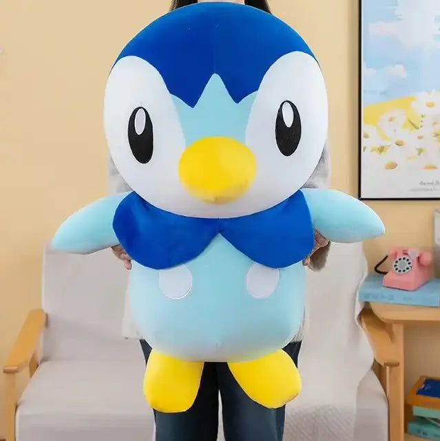 peluche pingouin bleu