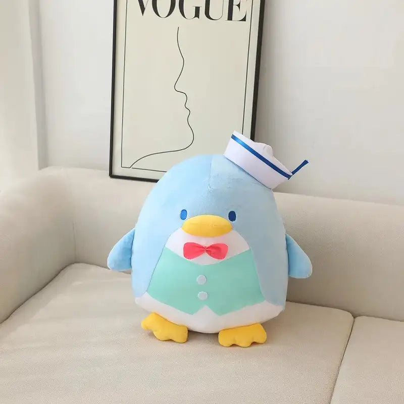 peluche pingouin colorée