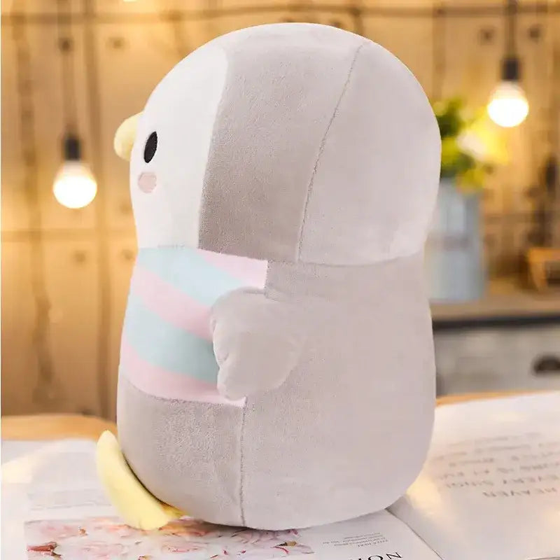 peluche pingouin coté