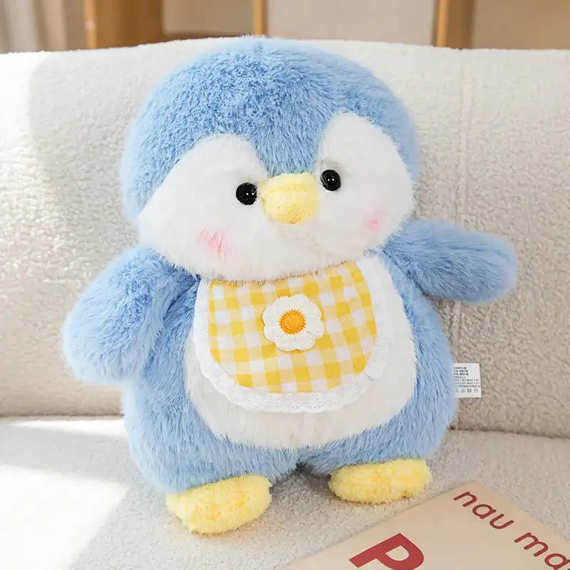 peluche pingouin gourmand bleu