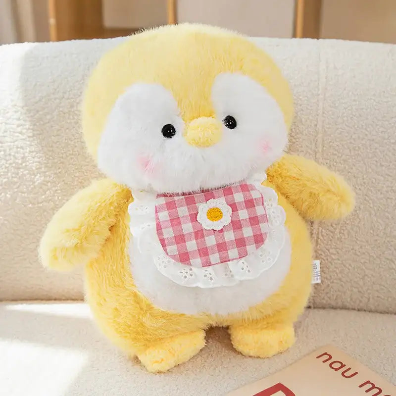 peluche pingouin gourmand jaune