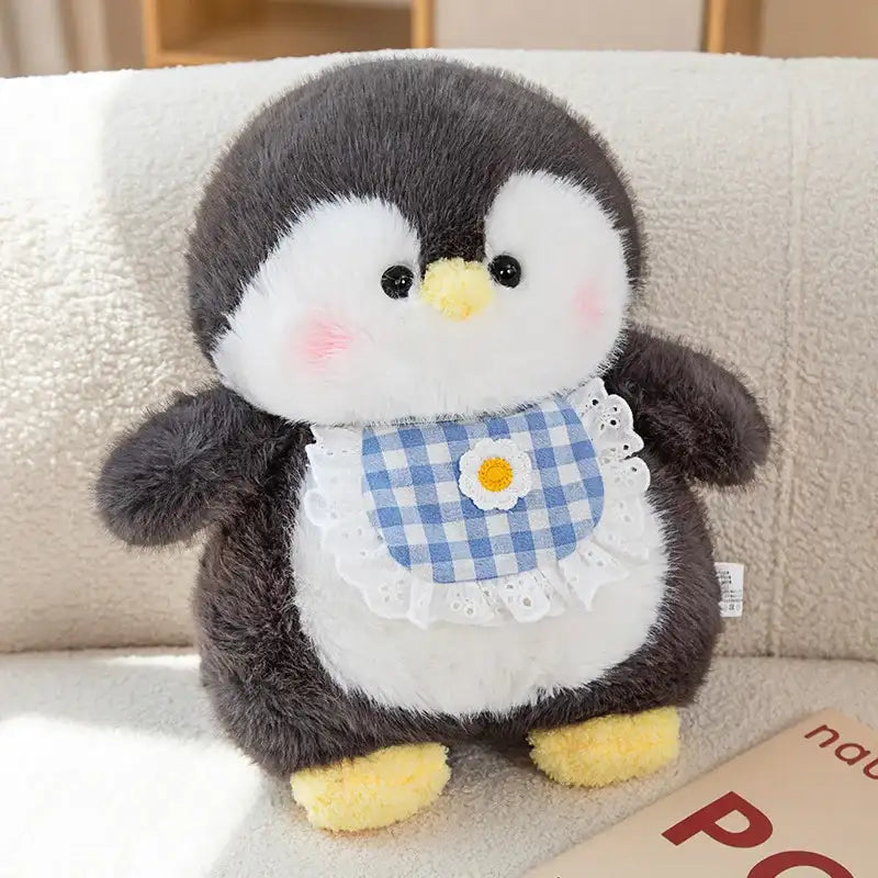 peluche pingouin gourmand noir