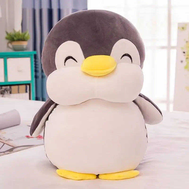 peluche pingouin heureux noir