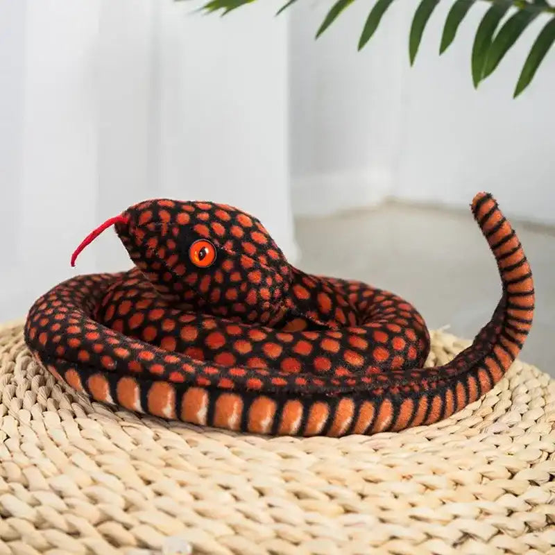 peluche serpent rouge yeux rouges