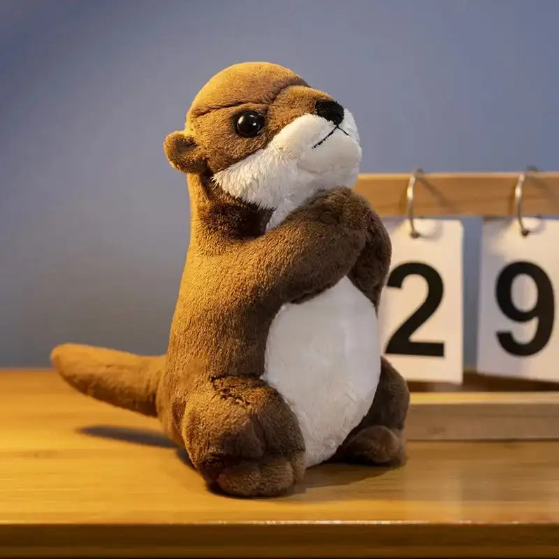 petite peluche loutre marron