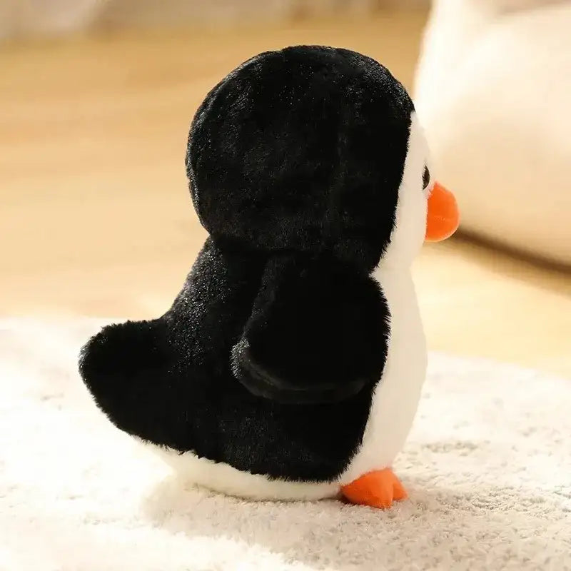 petite peluche pingouin